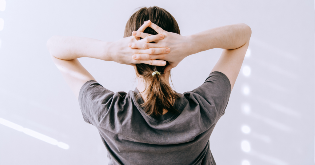 Woman Stretching Shoulders at Home